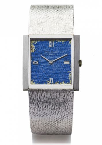 PATEK PHILIPPE REF. 3571/1 WHITE GOLD.Patek Philippe, Geneve. No. 1171879, case No. 2698746.Ref. 3571 1. Made in the 1970s..Fine, manual winding, thin, rectangular, 18K white gold.wristwatch with integrated Patek Philippe woven bracelet.