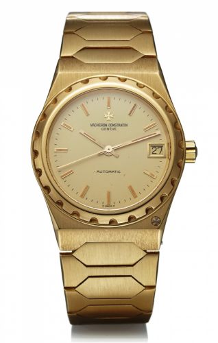 VACHERON & CONSTANTIN 222.AUTOMATIC YELLOW GOLD.Vacheron Constantin, Genève, 222, case No. 554016.Ref. 60001. Made in the 1980s..Fine, tonneau-shaped, self-winding, water-resistant, 18K.yellow gold wristwatch with date and an 18K yellow gold.integrated li