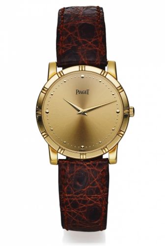 PIAGET REF. 84023N.QUARTZ YELLOW GOLD.Piaget, Quartz, case No. 661216, Ref. 84023 N. Made in the 1990's..Fine, 18K yellow gold quartz wristwatch with an 18K yellow gold Piaget buckle..Dial, case and movement signed.