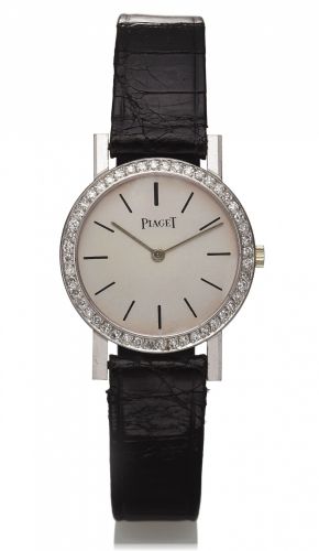 PIAGET, REF. 925 LADY'S.DIAMONDS WHITE GOLD.Piaget, No. 635329, case No. 92345, Ref. 925. Made in the 1970's. Fine, 18K white.gold and diamond-set lady's wristwatch with an 18K white gold Piaget buckle..Dial, case and movement signed.