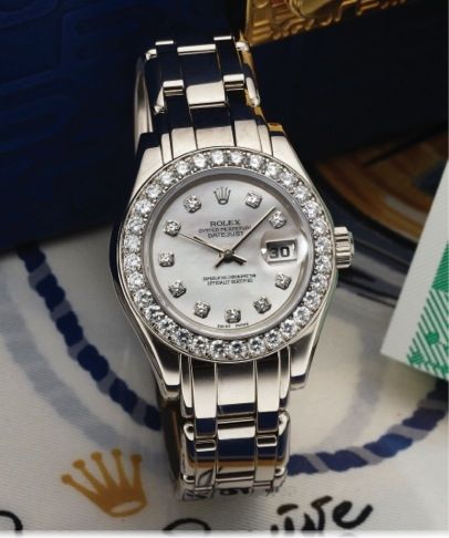 ROLEX REF. 69299 LADY DATEJUST PEARLMASTER.MOTHER-OF-PEARL DIAL WHITE GOLD.DIAMONDS.Rolex, Oyster Perpetual, Datejust, Superlative Chronometer Officially.Certified, Ref. 69299. case No. W056351. Made in 1998..Very fine and rare, center seconds, self-windi