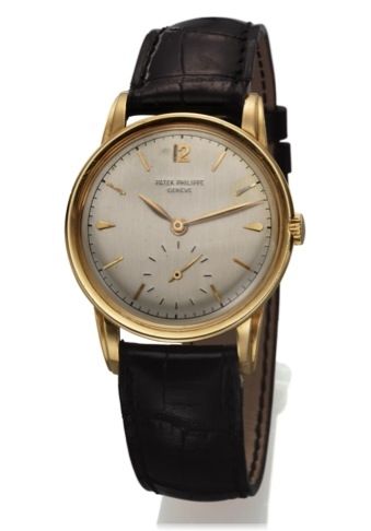 PATEK PHILIPPE REF. 2452 YELLOW GOLD.Patek Philippe, Genève, No. 725377, case No. 687010, Ref. 2452..Made circa 1955..Fine and rare 18K yellow gold wristwatch.