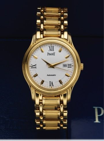PIAGET REF. 24001 AUTOMATIC YELLOW GOLD.Piaget, Automatic, case No. 588063, Ref. 24001 M 501 D..Made in 1993..Very fine, center seconds, self-winding, water-resistant.18K yellow gold wristwatch with date and an 18K yellow.gold Piaget link bracelet with do