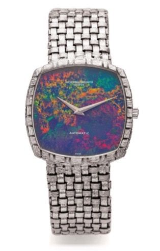 VACHERON & CONSTANTIN REF. 7391.OPAL DIAL AND WHITE GOLD.Vacheron & Constantin, Genève, No. 656445.case No. 478429, Ref. 7391. Made in the 1970s..Fine and rare, square and thin, self winding.18K white gold wristwatch with opal dial and an.integrated 18K w