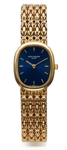 PATEK PHILIPPE REF. 4764/1.LADY'S ELLIPSE YELLOW GOLD.Patek Philippe, Geneve, Ellipse, No. 1612770.case No. 2895892, Ref. 4764/1. Made in the 1990s..Fine, 18K yellow gold lady's quartz wristwatch with an integral 18K yellow gold Patek Philippe.bracelet..D