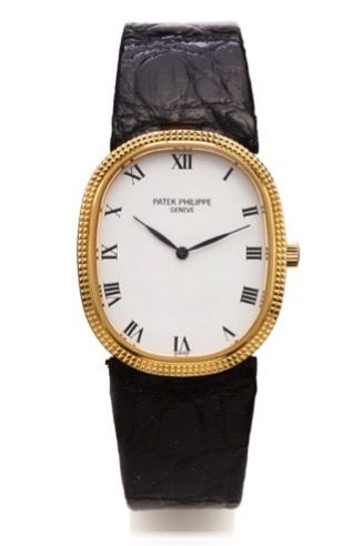 PATEK PHILIPPE REF. 3986.ELLIPSE YELLOW GOLD.Patek Philippe, Genève, Ellipse, No. 1336927, case.No. 2833046, Ref. 3986. Made in the 1980s..Fine, oval, 18K yellow gold wristwatch with an 18K.yellow gold buckle. Accompanied by a box..Dial, case and movement