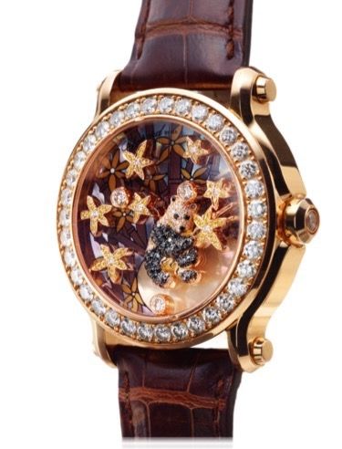 CHOPARD ANIMAL WORLD BAMBOO PANDA.DIAMOND AND PINK GOLD.Chopard, Geneve, ''Animal World Bamboo Panda'', No. 1649311..Made in a limited edition of 50 pieces circa 2010..Fine and rare, elegant, 18K pink gold and diamond set lady's.quartz wristwatch and 18K 