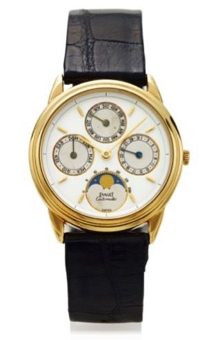 PIAGET REF. 15958 TRIPLE DATE.MOONPHASES YELLOW GOLD.Piaget, Genève, No. 514596, Ref. 15958. Made in the 1990's..Fine, astronomic, self-winding, 18K yellow gold wristwatch with triple date, lunar calendar and moon phases, and an 18K.yellow gold Piaget buc