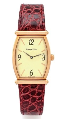 AUDEMARS PIGUET CARNEGIE PINK GOLD.Audemars Piguet, Genève, Carnegie, case No. D 69361.Ref. 14941. Made in the 1990s..Very fine, tonneau-shaped, 18K pink gold wristwatch with.an 18k pink gold Audemars Piguet buckle..Dial, case and movement signed.