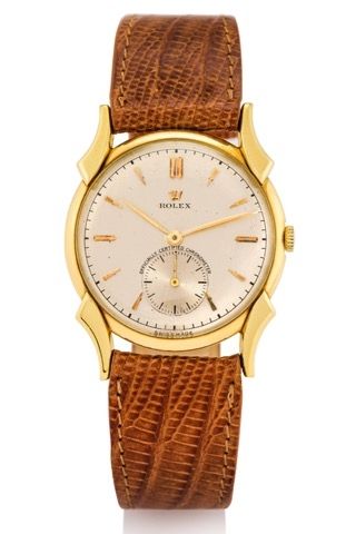 ROLEX REF. 4477 YELLOW GOLD.Rolex, Officially Certified Chronometer, Ref. 4477. Case No..Illegible. Made in 1945/46..Fine and rare, 18K yellow gold gentleman's wristwatch with gold.plated Rolex buckle.