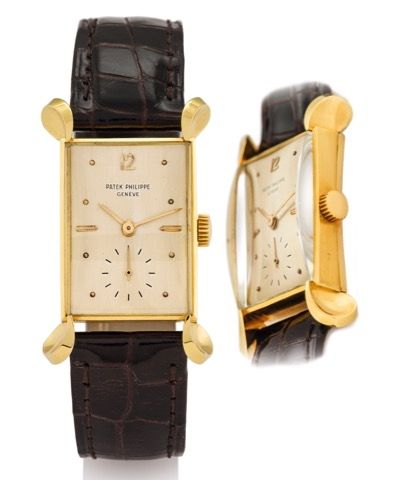 PATEK PHILIPPE REF. 2414.SO-CALLED TOPOLINO GLASS YELLOW GOLD.Patek Philippe, Genève, No. 971620, case No. 511303, Ref. 2414..Made circa 1949..Very fine and very rare, rectangular, 18K yellow gold wristwatch.