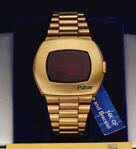 PULSAR DIGITAL TIME COMPUTER YELLOW.GOLD-PLATED.Pulsar Digital Time Computer case No. 54102. Made circa 1972..Fine water-resistant, cushion-shaped, 14K yellow gold-plated, LED.digital quartz wristwatch with a yellow gold-plated link bracelet.with deployan