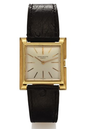 PATEK PHILIPPE REF. 2562 YELLOW GOLD.Patek Philippe & Cie, Genève, No. 855696, case No. 689874.Ref. 2562. Made circa 1955..Very fine and unusual, square, 18K yellow gold wristwatch with an.18K yellow gold Patek Philippe buckle.