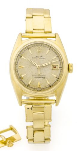 ROLEX REF. 6104 YELLOW GOLD Rolex, "Oyster Perpetual, Datejust, Officially Certified Chronometer," case No. no longer visible Ref. 6104. Made circa 1955. Fine and rare, tonneau-shaped, water-resistant, center seconds, self-winding 18K yellow gold wristwat