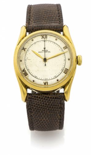 ROLEX REF. 5018 "BOMBAY" YELLOW GOLD A fine and rare self-winding 18K yellow gold wristwatch.