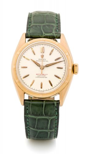 ROLEX, REF. 6085, RED OFFICIALLY A fine and rare, self-winding, 18k pink gold wristwatch.