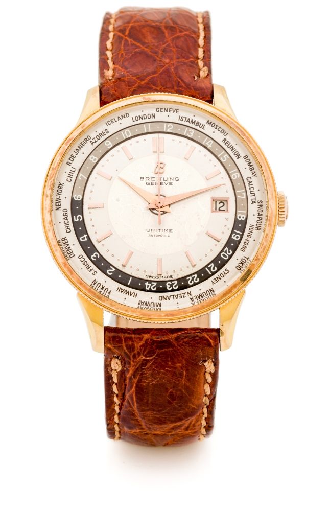 BREITLING, UNITIME, GOLD-PLATED A fine and very rare, manual wind, yellow gold plated world-time wristwatch.