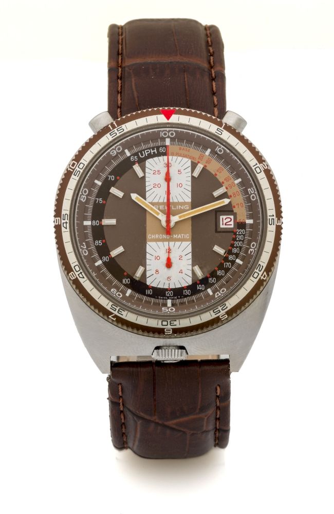 BREITLING REF. 2117 BULLHEAD TACHOMETER CHRONO-MATIC BROWN DIAL AND BEZEL Very rare, fine and unusual, self-winding, water-resistant, asymmetric, stainless steel wristwatch with round-button chronograph.