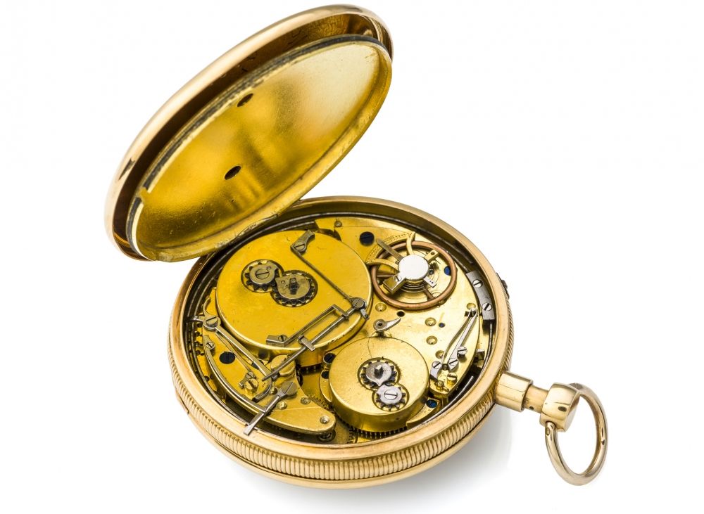 MUSICAL AND REPEATING GOLD POCKET WATCH Fine and rare, 18K gold, quarter-repeating, musical pocket watch with music playing on the hour or at will.