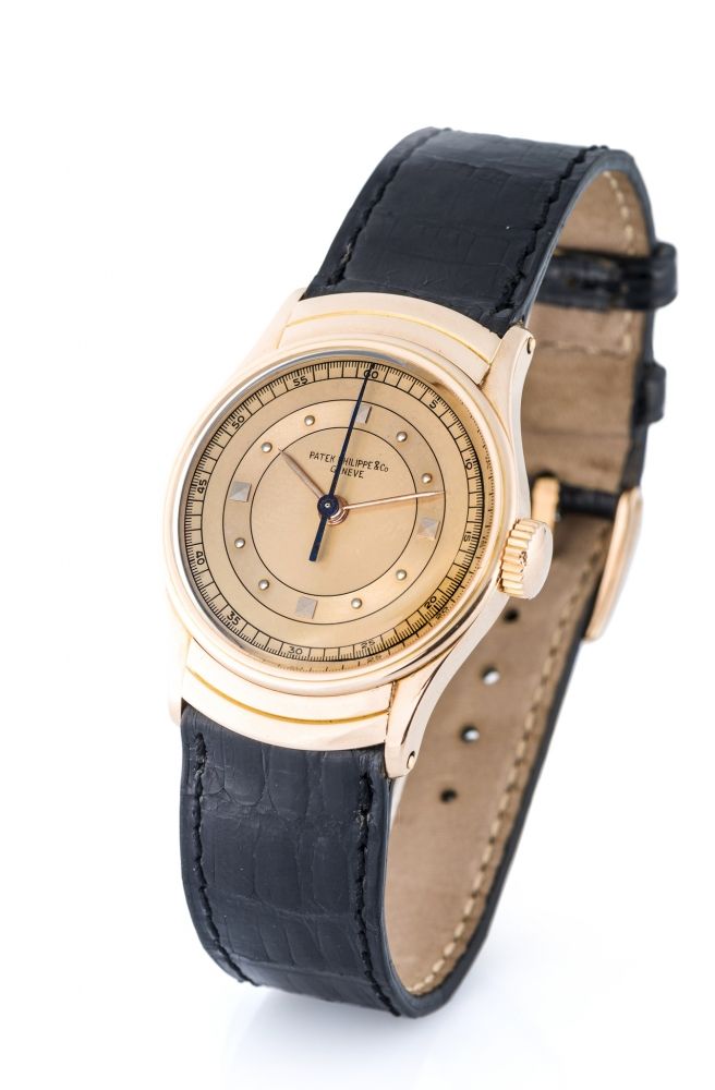 PATEK PHILIPPE, REF. 539, "THE ARMADILLO", PINK GOLD A very fine and extremely rare, manual wind, center-seconds, 18k pink gold wristwatch with hooded lugs