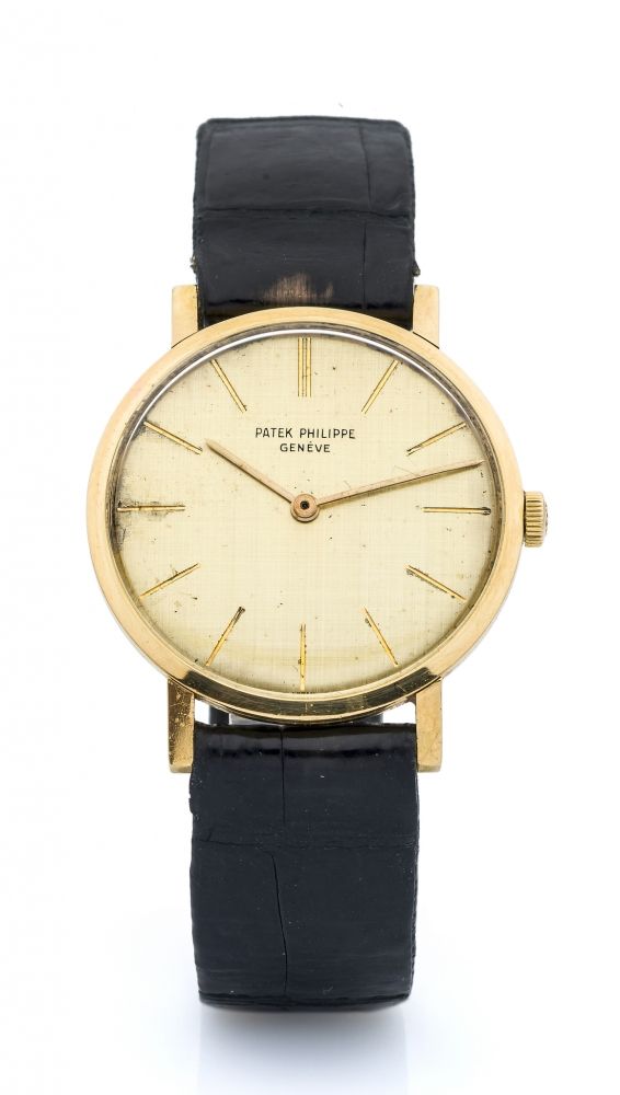 PATEK PHILIPPE, REF. 3426 A fine, thin, manual wind, 18k yellow gold dress wristwatch.