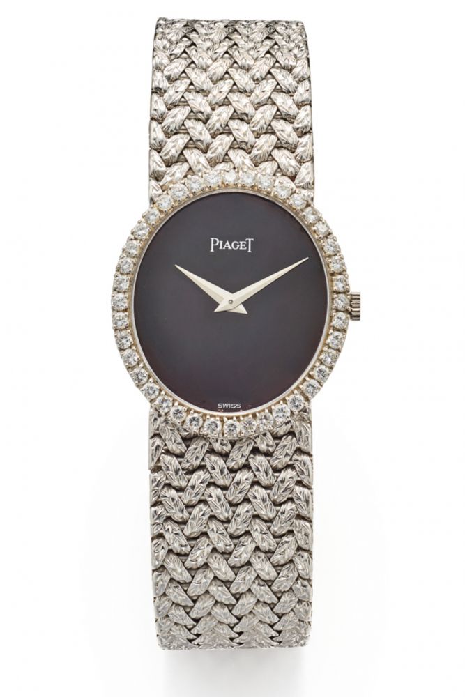 PIAGET REF. 9826, BLACK DIAL, DIAMOND-SET OVAL BEZEL. 18K WHITE GOLD AND DIAMONDS