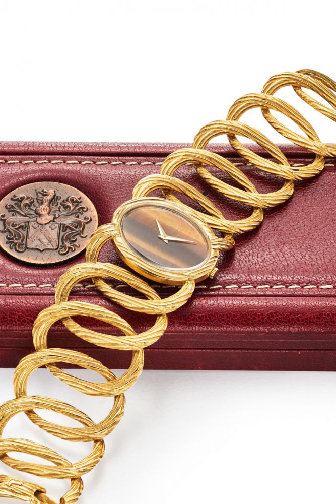 PIAGET TIGER’S EYE (QUARTZ STONE) DIAL AND TEXTURAL BRACELET. 18K YELLOW GOLD AND TIGER’S EYE
