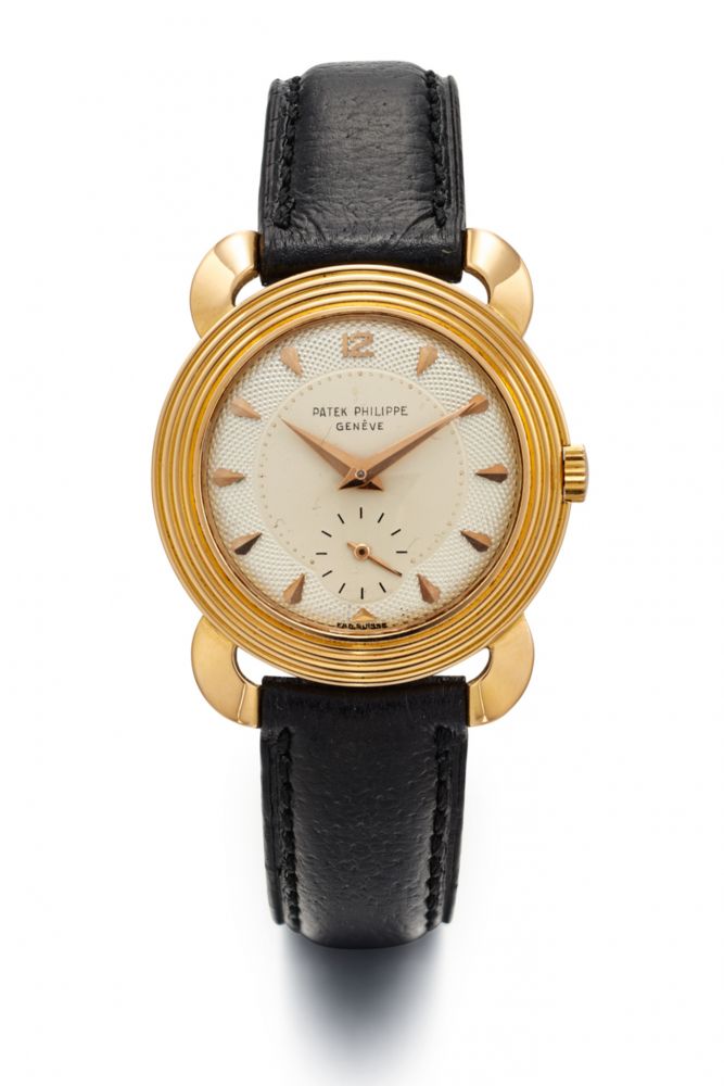 PATEK PHILIPPE REF. 2549-1, OVERHANGING HORN SHAPED LUGS, SILVER GUILOCHÉ DIAL. 18K PINK GOLD
