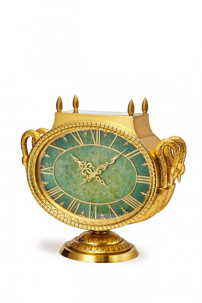 PATEK PHILIPPE REF. 813.00 E, “EMPIRE”-STYLE “SOLAR” MANTEL-CLOCK, JADE GREEN LACQUERED DIAL. GILDED BRONZE