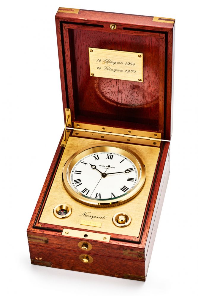 PATEK PHILIPPE REF. E 1215, MARINE CHRONOMETER, “NAVIQUARTZ III”. MAHOGANY AND GILDED BRASS
