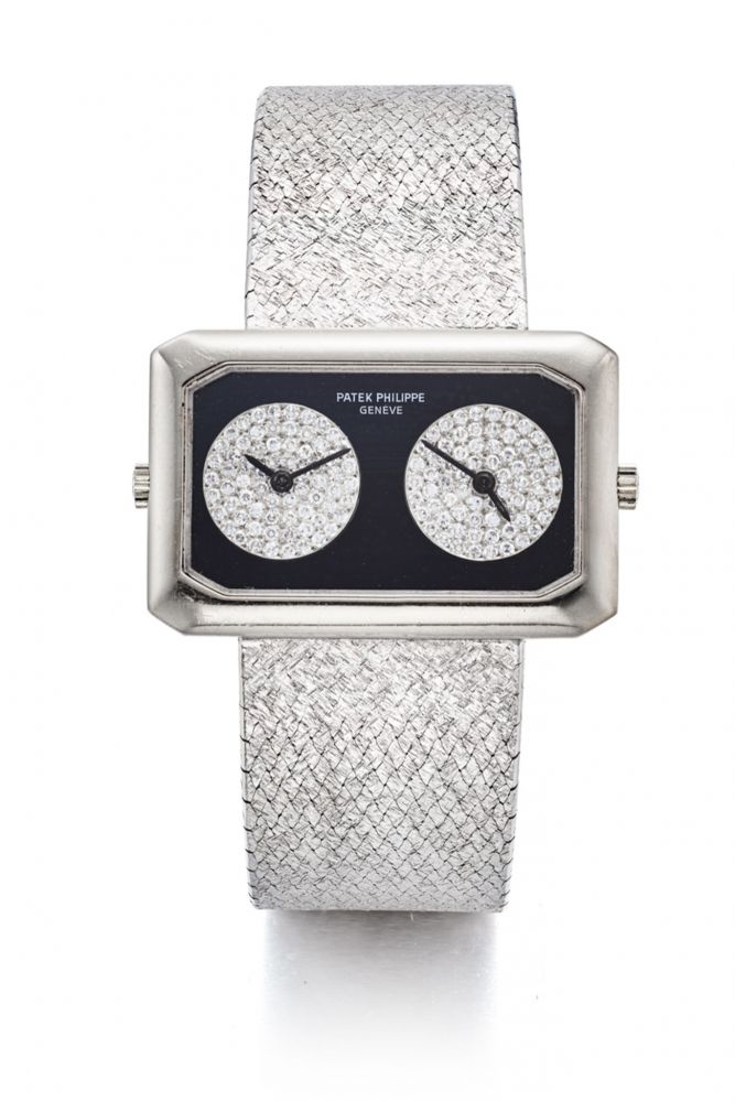 PATEK PHILIPPE REF. 4404-4, TWO-TIME ZONE, TWO MOVEMENTS, DIAMOND-SET BLACK ONYX DIAL. “DUAL-TIME” SO-CALLED “GEMINI”. 18K WHITE GOLD AND DIAMONDS