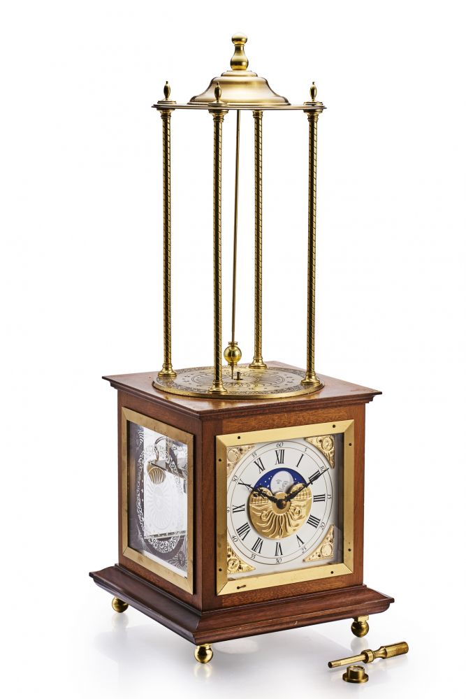 THE NATIONAL MARITIME MUSEUM TABLE CLOCK WITH CONICAL PENDULUM AND MOON PHASES. LIMITED EDITION. GILDED BRASS AND WOOD