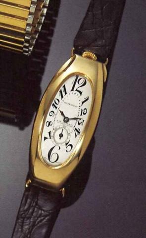 Movado, Polyplan Chronometer, for.A. H. Ismail, Calcutta & Colombo, 1930's..Rare, tonneau shaped, curved, 18ct gold gentleman's.wristwatch.