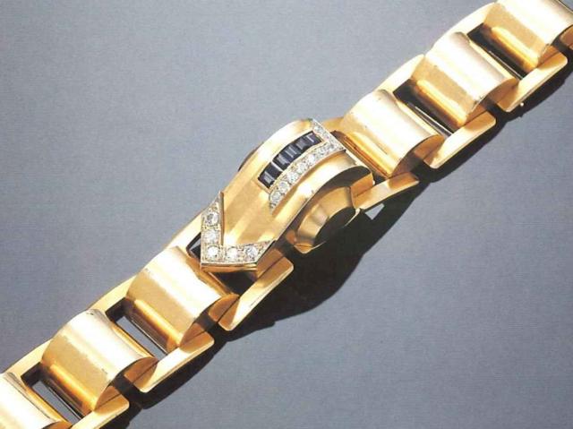 Rolex Precision, Ref. 3771, 1940 's..Very fine and rare 18ct pink gold, sapphires and.diamonds Iady's wristwatch with concealed dial and.18 ct pink gold linked bracelet and fitted box.