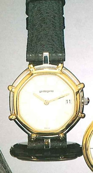 G_rald Genta, Ref. 2850.7, present series..Fine octogonal, 18ct gold and stainless steel.gentleman's wristwatch with date and fitted box.