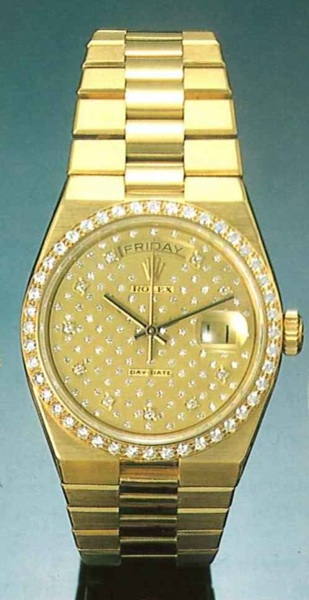 Rolex Day-Date, Ref. 19000, 1980's..Fine center second, 18ct gold and diamonds.gentleman's wristwatch with date and day and 18ct.gold integrated bracelet.