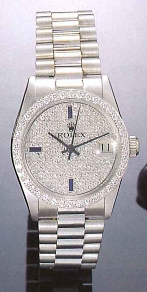 Rolex Date-Just, Ref. 6828, 1970's..Fine and unusual centre second, self-winding, 18ct.white gold and diamonds mid-size wristwatch.