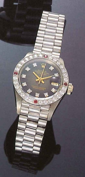 Rolex Oyster Perpetual Date-Just, Superlative.Chronometer, Officially Certified, Ref. 6906, 1960's..Fine and unusual centre second, self-winding, 18ct.white gold, rubies and diamonds Iady's wristwatch.with date.