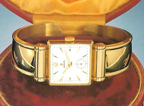 Rolex, Ref. 8148, 1940's..Very fine square, 18ct pink gold Iady's wristwatch.with a wide 18ct pink gold bangle bracelet and fitted.box.