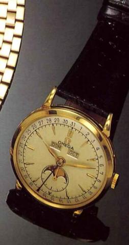 Omega, Ref. 2659, 1950's..Fine astronomic, 18ct gold gentleman's.wristwatch with triple date and moon phases.