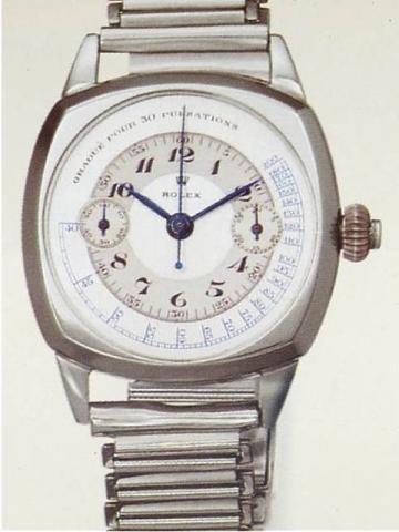 Rolex, Ref. 2022. Produced in the 1930's..Fine and rare cushion-shaped stainless steel gentleman's wristwatch with coaxial single button chronograph on the crown, register and pulsometer, a stainless steel Rolex bracelet.