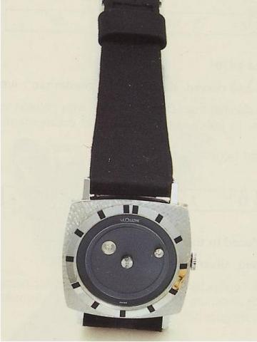 LeCoultre, Ref. 7511 B. Produced in the 1960's.Fine, square, 14K white gold gentleman's Mistery wristwatch. Accompanied by a box.