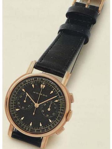 Movado, Ref. 9023. Produced in the 1950's.Fine, 18K pink gold gentleman's wristwatch with square button chronograph, register and pulsometer and a Movado buckle.