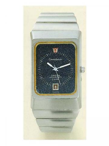 Omega, Constel-lation, Megaquartz F2.4 MHz, No. 3960806. Produced in the 1970's.Fine and large, center-seconds, water-resistant, rectangular, stainless steel quartz gentleman's wristwatch with date and an integrated Omega stainless steel link bracelet.