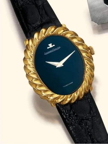 Jaeger LeCoultre, No. 1526007, Ref. 9215-21. Produced in the 1970's.Fine and unusual, flat, oval, 18K yellow gold lady's wristwatch with a yellow gold-plated Jaeger LeCoultre buckle.