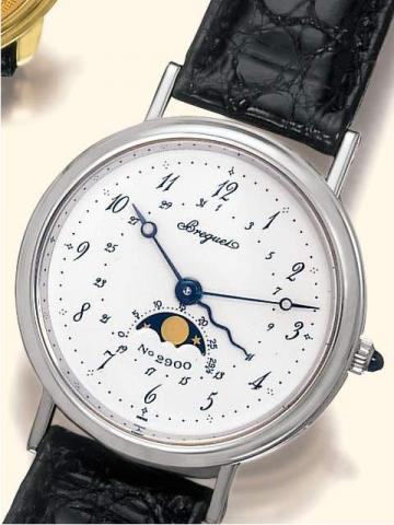 Breguet Serpentine, No. 2900, Ref. 3047. Produced in the 1990's.Very fine astronomic, self-winding, 18K white gold gentleman's wristwatch with date, moon phases and age of the moon, and an 18K white gold Breguet buckle.