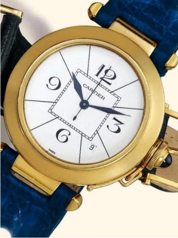Cartier, Pasha, Automatic, Ref. 0103. Produced in the 1980's.Fine center-seconds, self-winding, water-resistant to 330 ft/100m, 18K yellow gold gentleman's wristwatch with date, blue leather strap and an 18K yellow gold Cartier buckle.