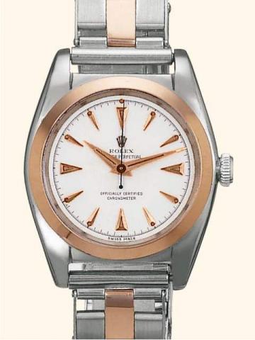 Rolex Oyster Perpetual, Officially Certified Chronometer, Rolesor, Ref. 5010. Produced in the 1940's.Fine tonneau-shaped, center-seconds, self-winding, water-resistant, stainless steel and pink gold gentleman's wristwatch, with a stainless steel and pink 