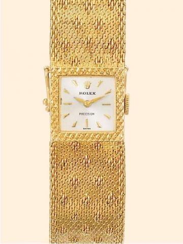 Rolex, Precision, Ref. 9725. Produced in the 1950 's..Fine, square, 18K yellow gold lady's wristwatch with 18K yellow gold woven bracelet 