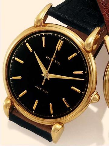 Rolex Precision, Ref. 4364. Produced in the 1940's..Fine, center-seconds, 18K yellow gold gentleman's wristwatch with a Rolex buckle.